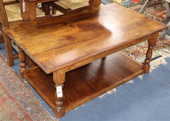 An oak two-tier coffee table with understage W.120cm